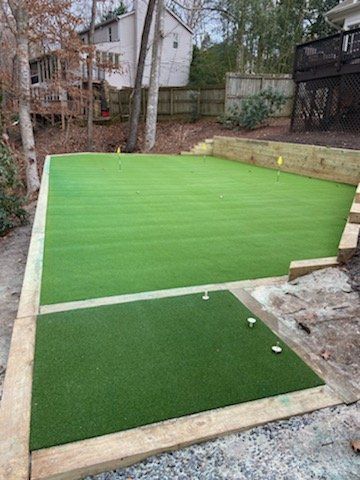 Artificial turf installation professionals at Morning Dew Landscapes.
