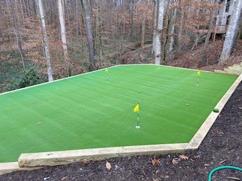 Artificial turf installation Marietta GA by Morning Dew Landscapes.